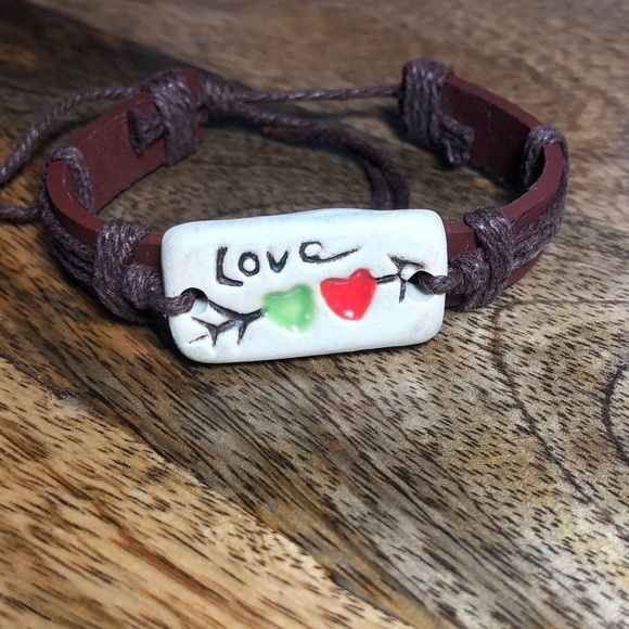 Jewelry - Leather LOVE Bracelet.  Love is written in stone!